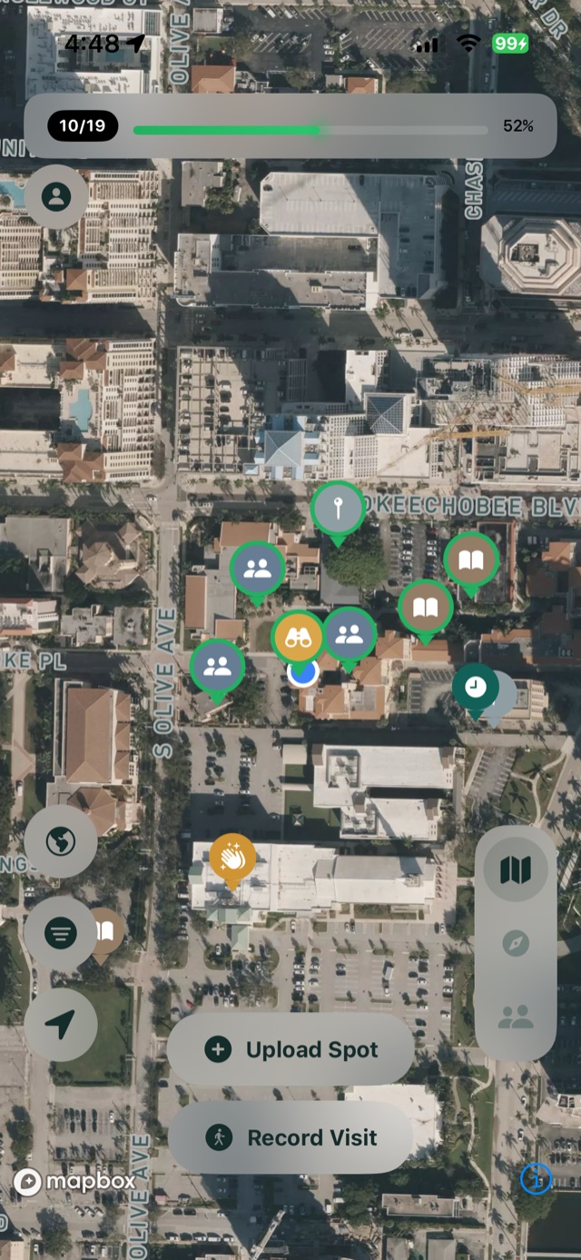 SideQuestr live map showing user-dropped spots around downtown with Upload Spot and Record Visit buttons